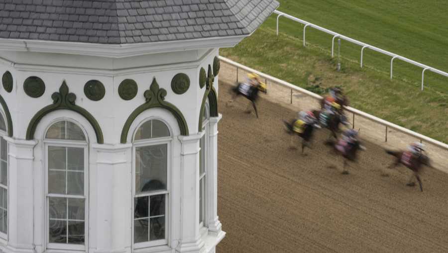 Horses run during the first race at Churchill Downs Saturday, May 6, 2023, in Louisville, Ky. (AP Photo/Charlie Riedel)